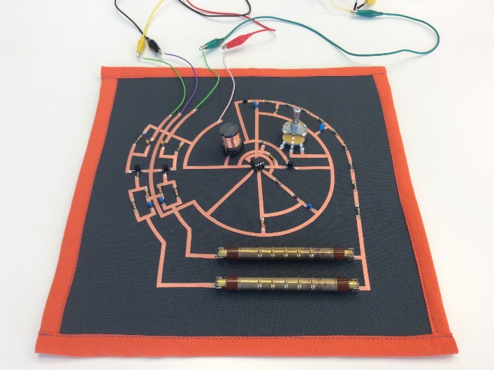 A textile with circuitry connected to wires